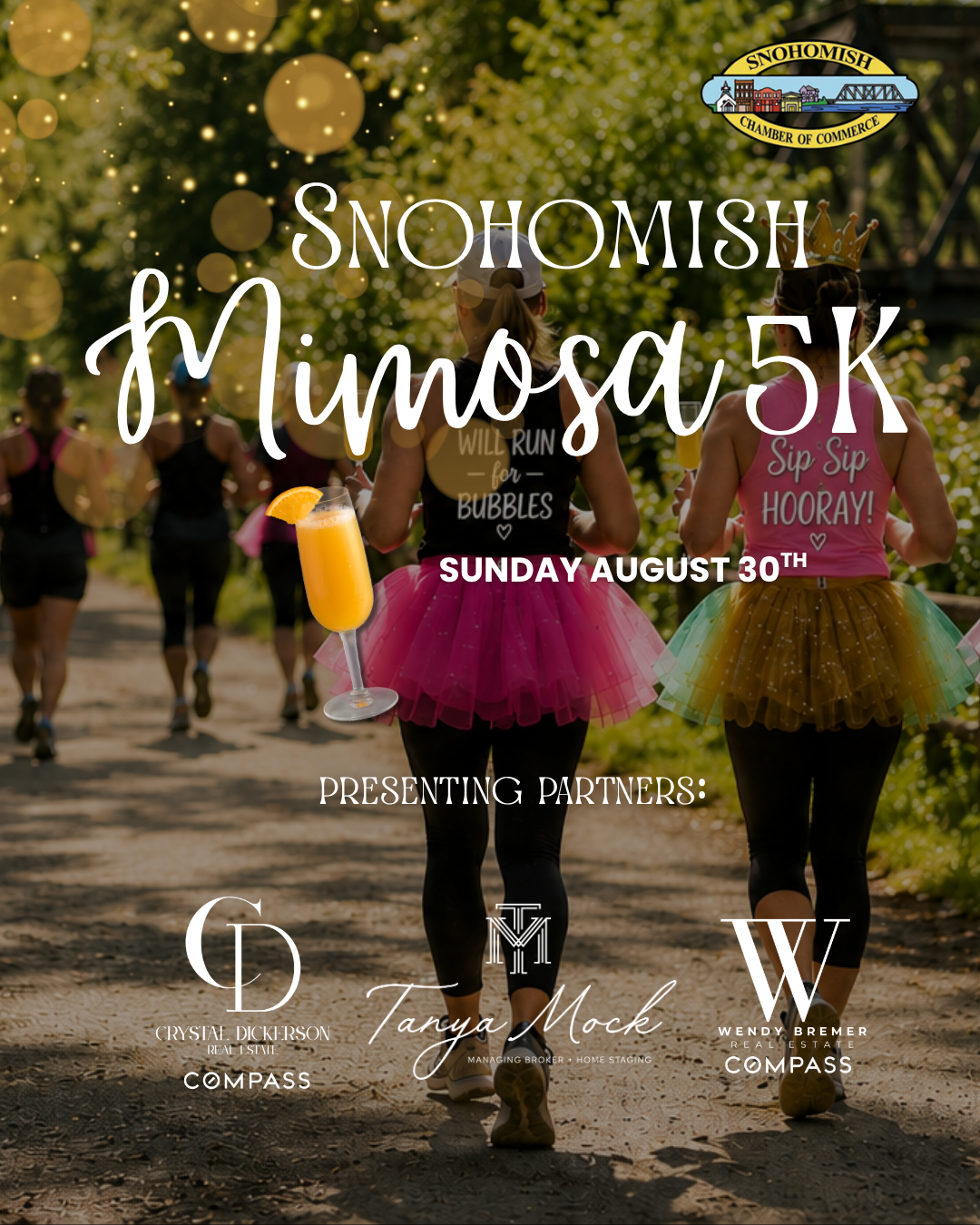 two women walking on a trail dressed in tutus drinking mimosas